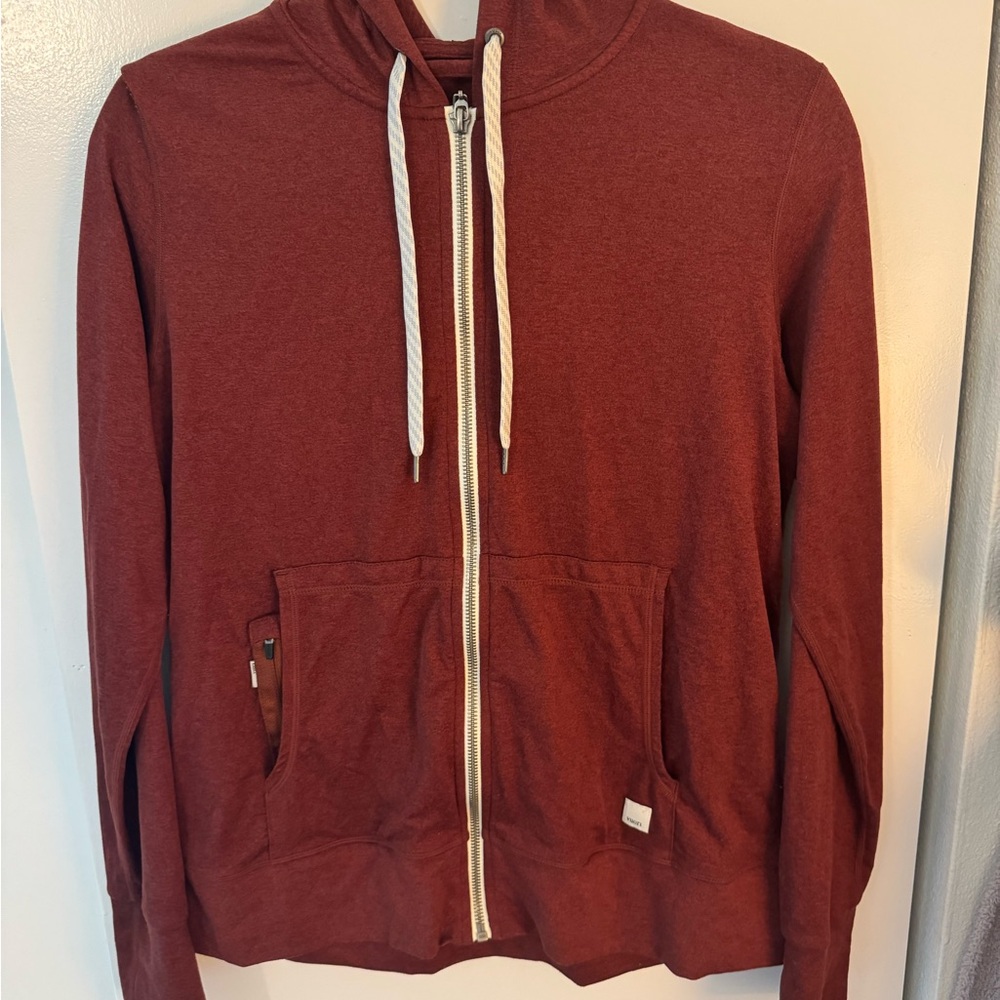 Vuori hooded lightweight sweatshirt. Color is burgundy